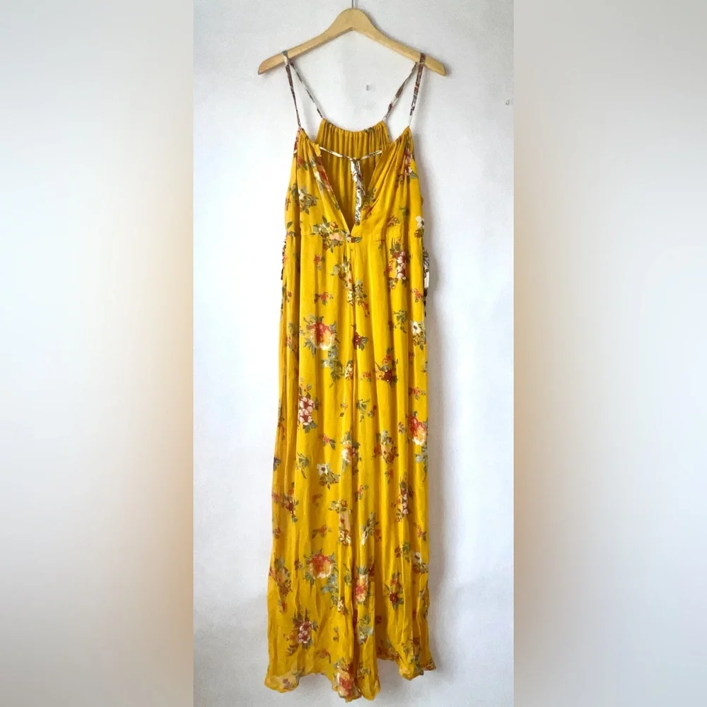Free people - Georgia Yellow floral jumpsuit size XS( flaw)